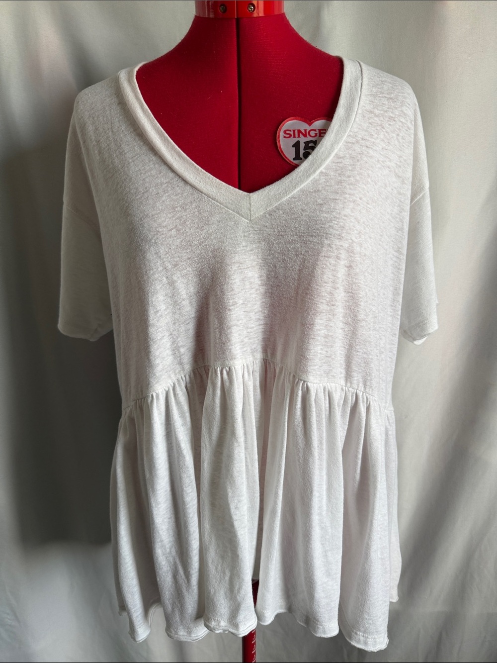 Truly Madly Deeply White V-Neck Peplum Tunic